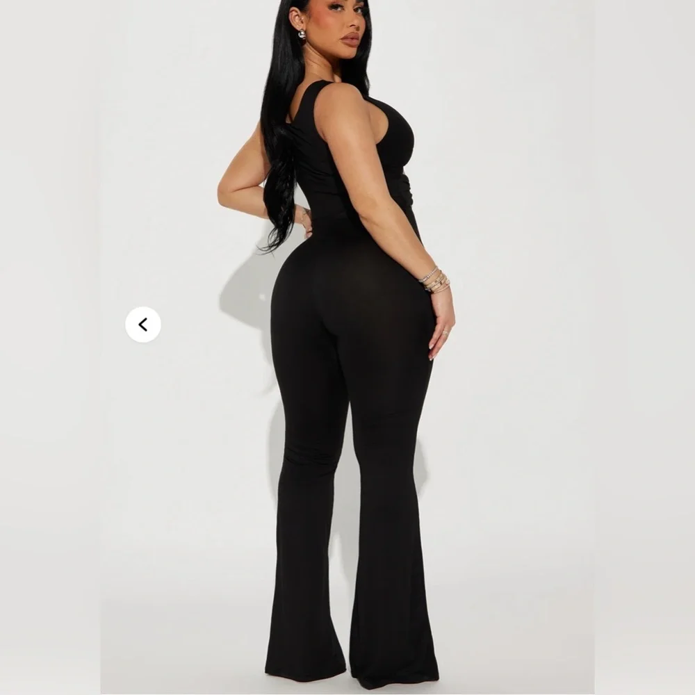 Fashion Nova Black Flared Cutout Jumpsuit - Picture 2 of 4